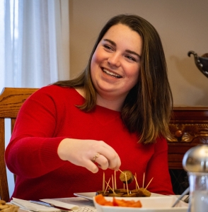 girl smiling with donair sausages